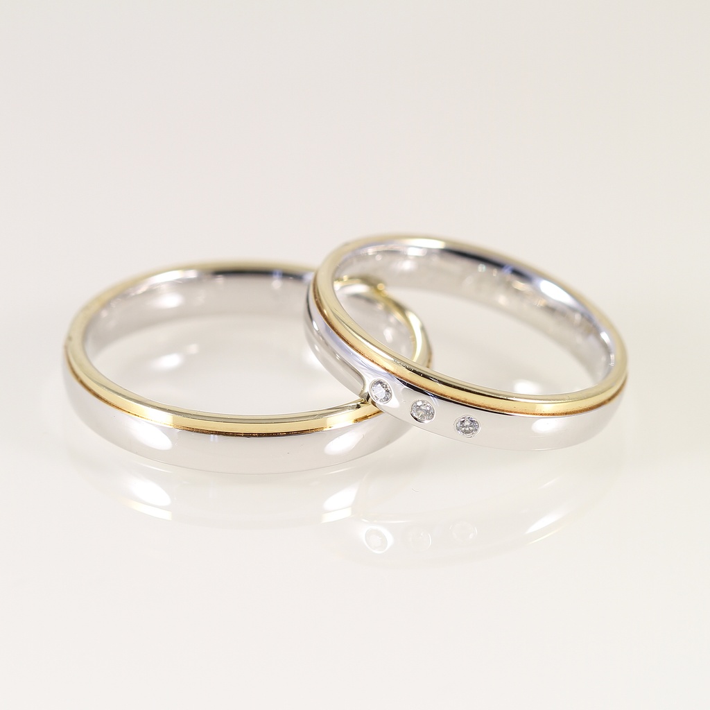 Arany karikagyűrű pár gyémánttal 0.027 ct